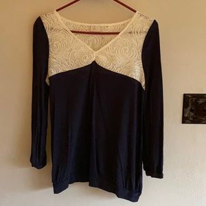 Feminine top with Lace top detail.